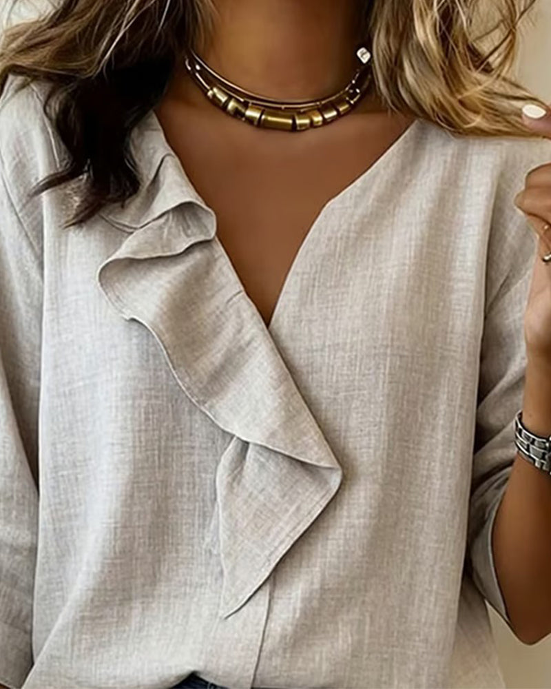 Blusa de manga larga de color liso con volantes-ES