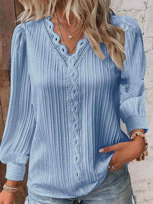 Elegante y moderna camisa de encaje para mujer en un color liso-ES