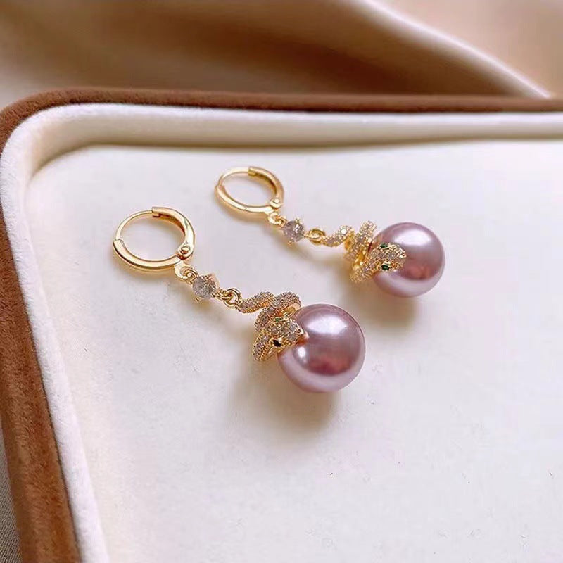 🐍Specjalna oferta noworoczna🎀 Kolczyki z pozłacanej perły w kształcie węża