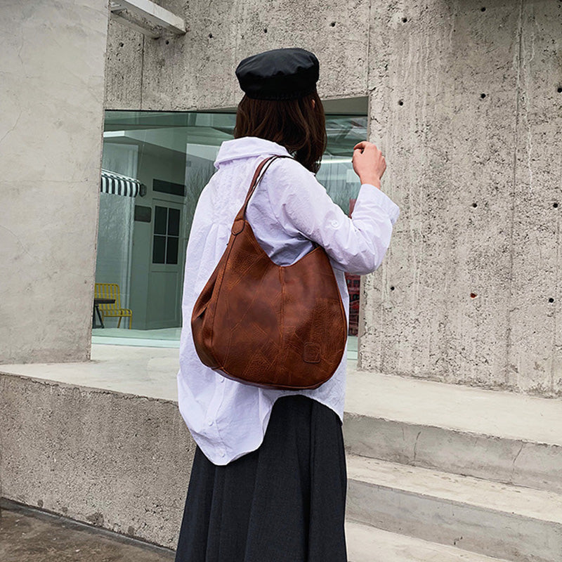 【🎊2025】 jauni produkti】👜Sieviešu vintage mīkstas ādas lielas ietilpības plecu somas-LV